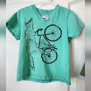 SOLD ❌️Green Graphic Tee with Wolf and Bicycle Design❌️